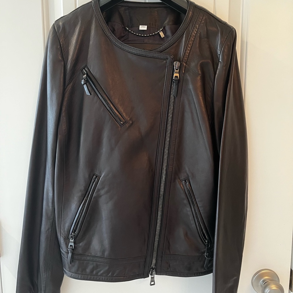 Coach motor jacket. Never worn. New leather smell.